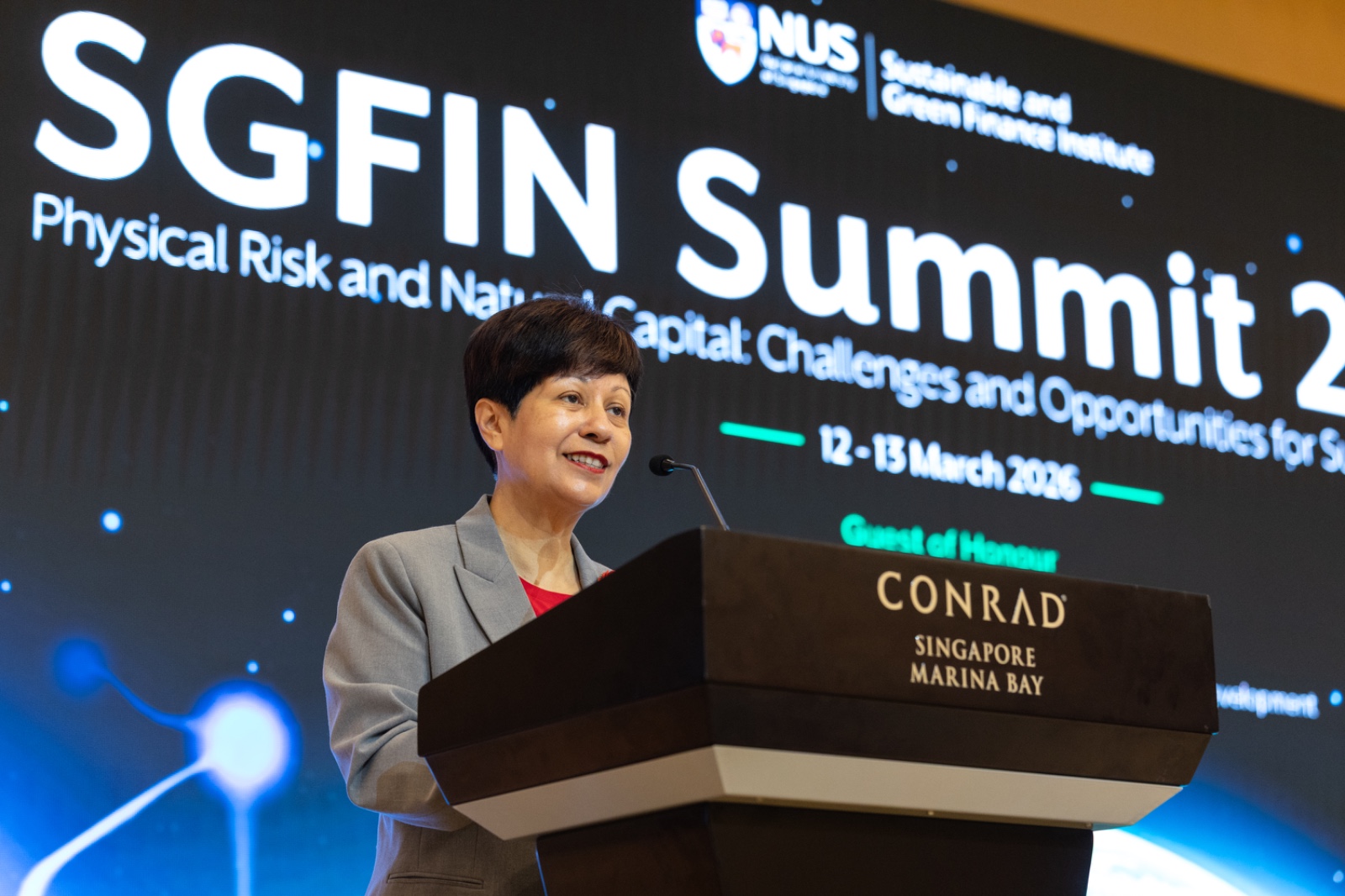 Guest-of-Honour Minister Indranee Rajah delivering the opening address at SGFIN Summit 2026.